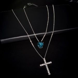 Silver Cross with Blue Heart Gem Layer Necklace